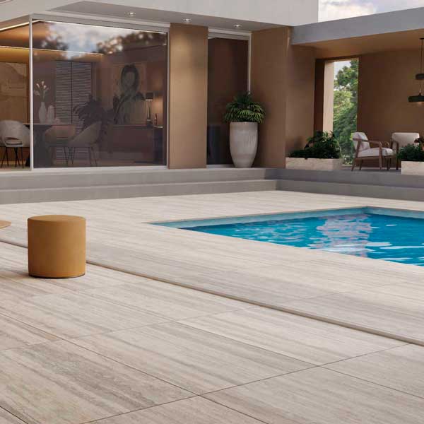 piscina skimmer infinity pool bordo toro e pavimento esterno piscina travertino