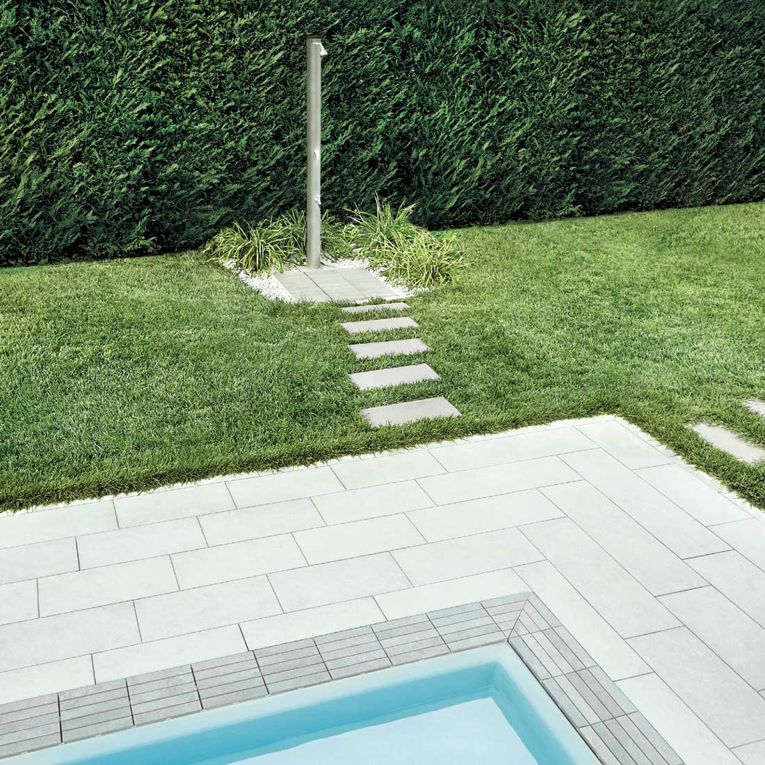 infinity pool with Directa Stone grey grid, Stone white floor