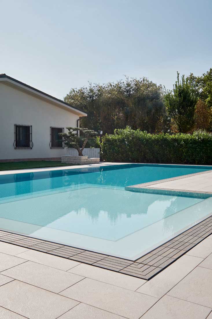 infinity pool with Directa Stone grey grid, Stone white floor